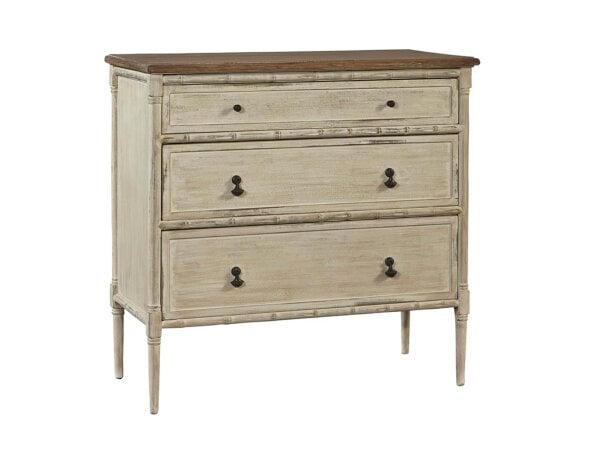 Vintage-style Emma Lou Chest with distressed white finish and dark wood top, featuring three drawers with black metal knobs, ideal for bedroom or living room decor.