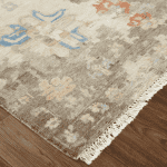 Ivory Noris 6892F area rug with floral and geometric patterns.