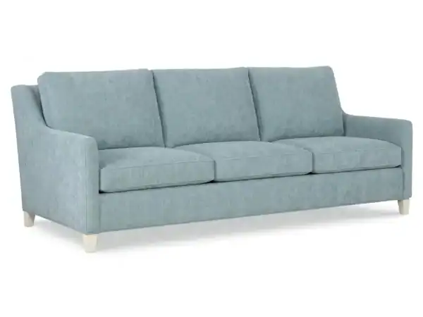 Modern Jada Long Sofa with three cushions and light blue upholstery, ideal for living rooms, from Swann's Furniture & Design in Tyler, Texas.