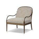 Upholstered armchair with wooden frame and curved metal arms, featuring textured cream fabric upholstery, perfect for stylish and comfortable living room decor.