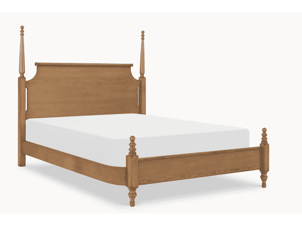 Solid wood bed frame with a high headboard and carved posts, showcasing classic craftsmanship.