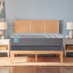 Elegant bedroom with Palatial Crest Cathedral Cove Medium Hybrid mattress.