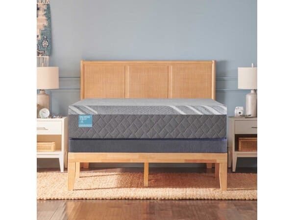 Elegant bedroom with Palatial Crest Cathedral Cove Medium Hybrid mattress.
