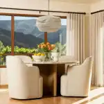 Elegant London dining chairs with cream upholstery surrounding a wooden table in a bright, scenic dining room. Perfect for stylish, comfortable dining spaces.