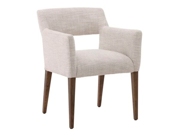 Elegant Booker dining chair with light fabric upholstery and wooden legs, perfect for modern dining rooms in Tyler, Texas.