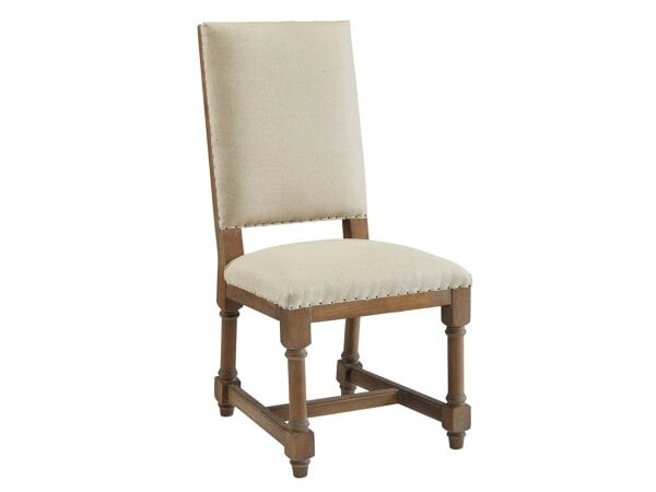 Elegant Boyles side chair with beige upholstery and wooden frame, perfect for dining or accent use in Tyler, Texas.